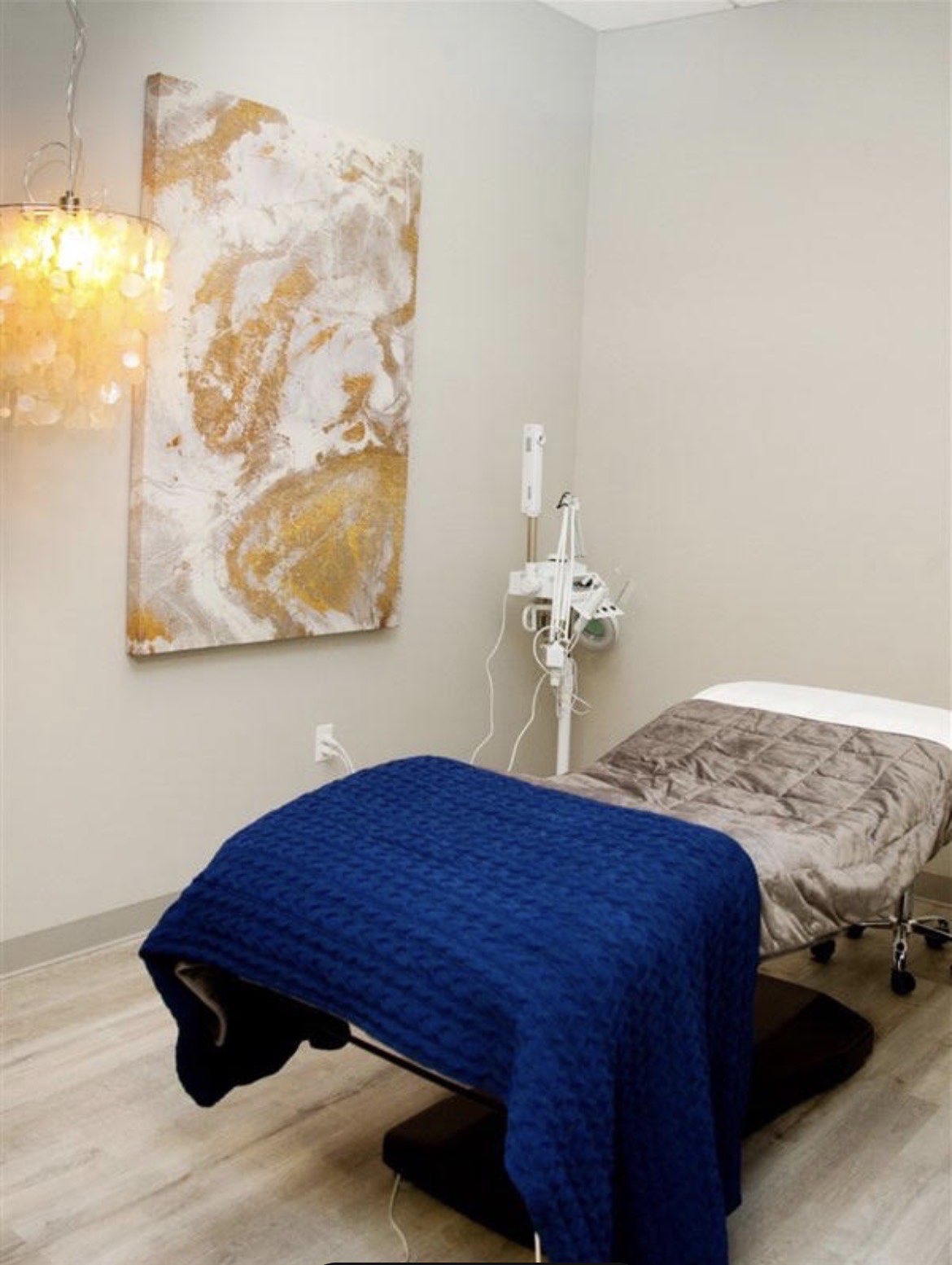 Treatment room with gold artwork